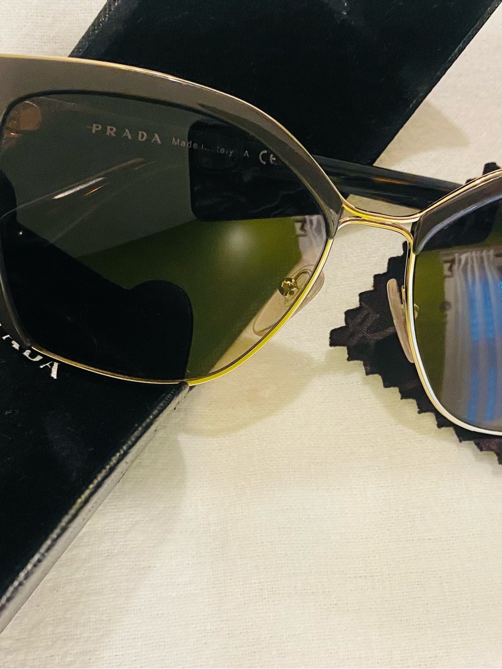 Prada Women’s Brown / Gold Frame Sunglasses - Black Lenses
